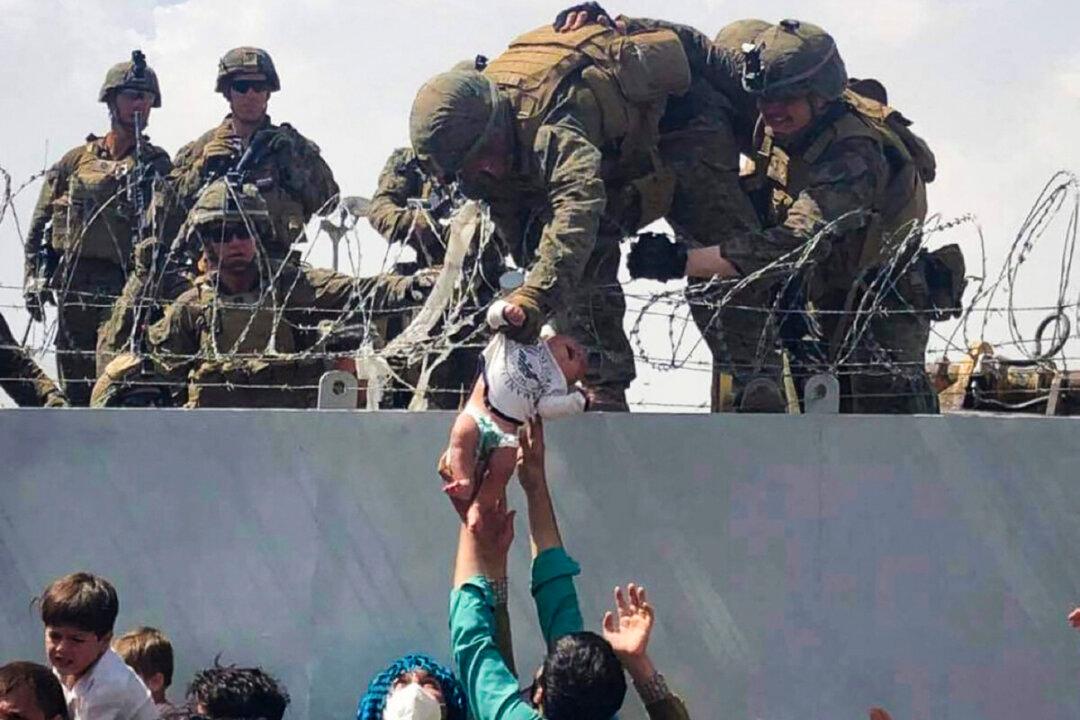 Scenes From Chaos: A Journalist Recounts Her Escape From Kabul