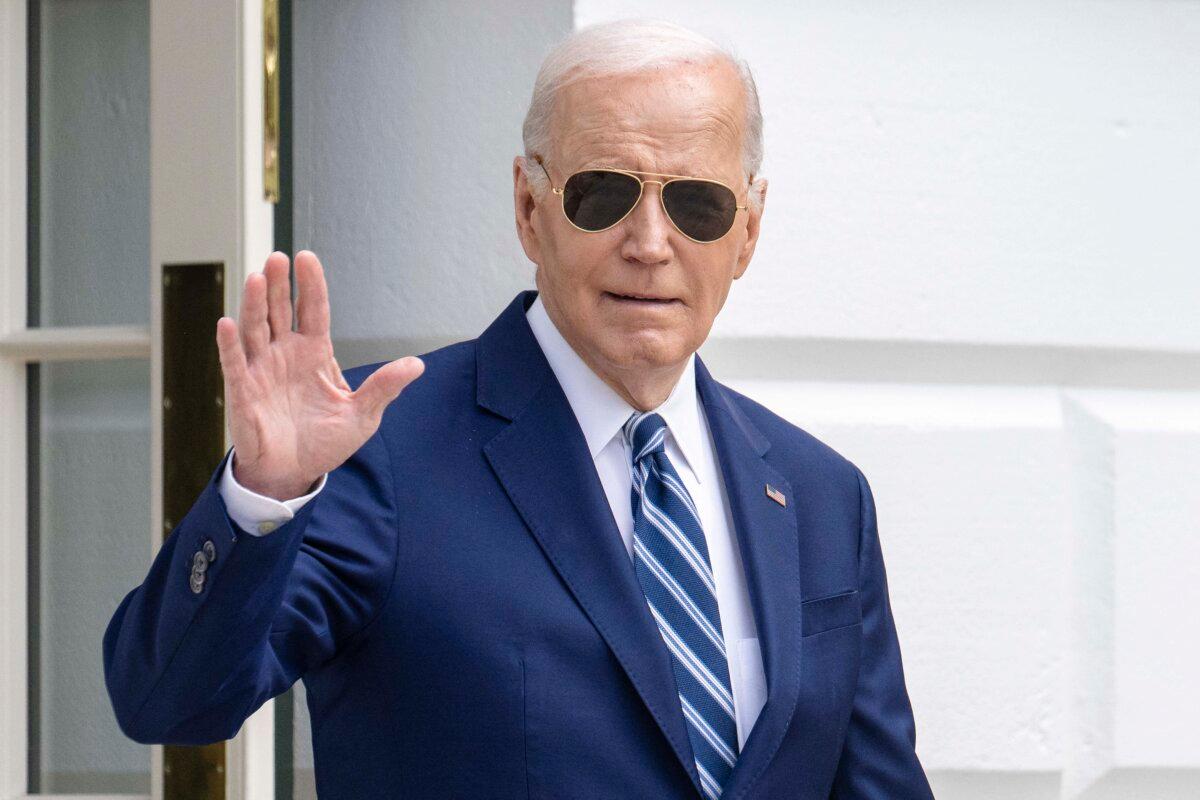 President Joe Biden waves as he walks to Marine One as he departs from the South Lawn of the White House in Washington on April 25, 2024, (Jim Watson/AFP via Getty Images)