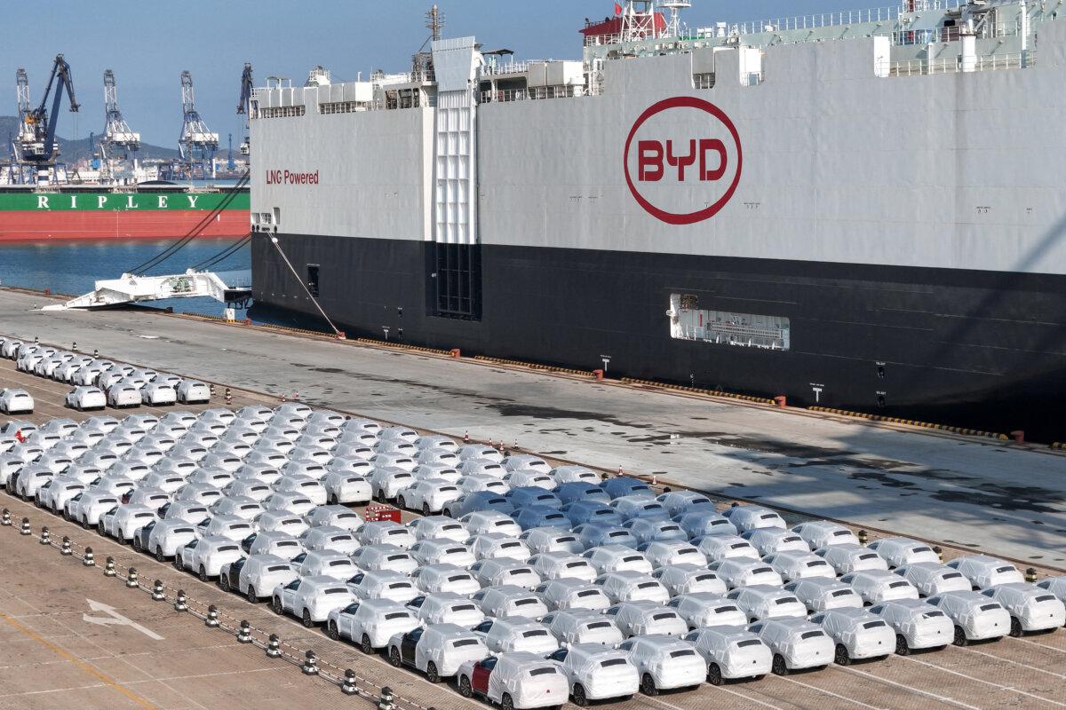 The photo taken on Jan. 10, 2024, shows BYD electric cars for export waiting to be loaded on the "BYD Explorer NO.1", a domestically manufactured vessel intended to export Chinese automobiles, at Yantai port in eastern China's Shandong province. (STR/AFP via Getty Images)