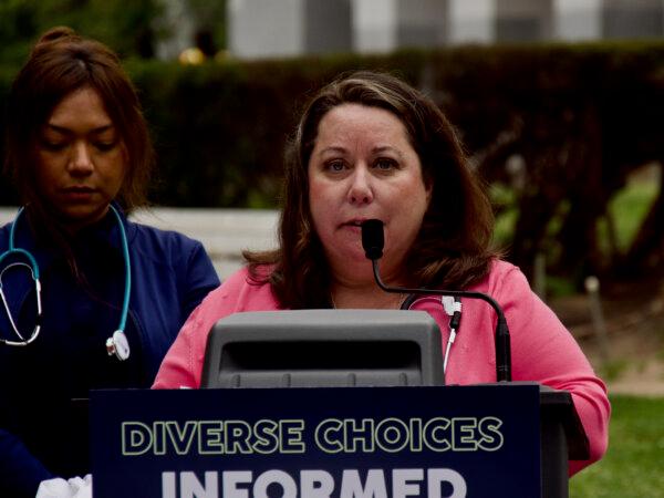 Registered nurse Angela Cox at the news conference. (Travis Gillmore/The Epoch Times)