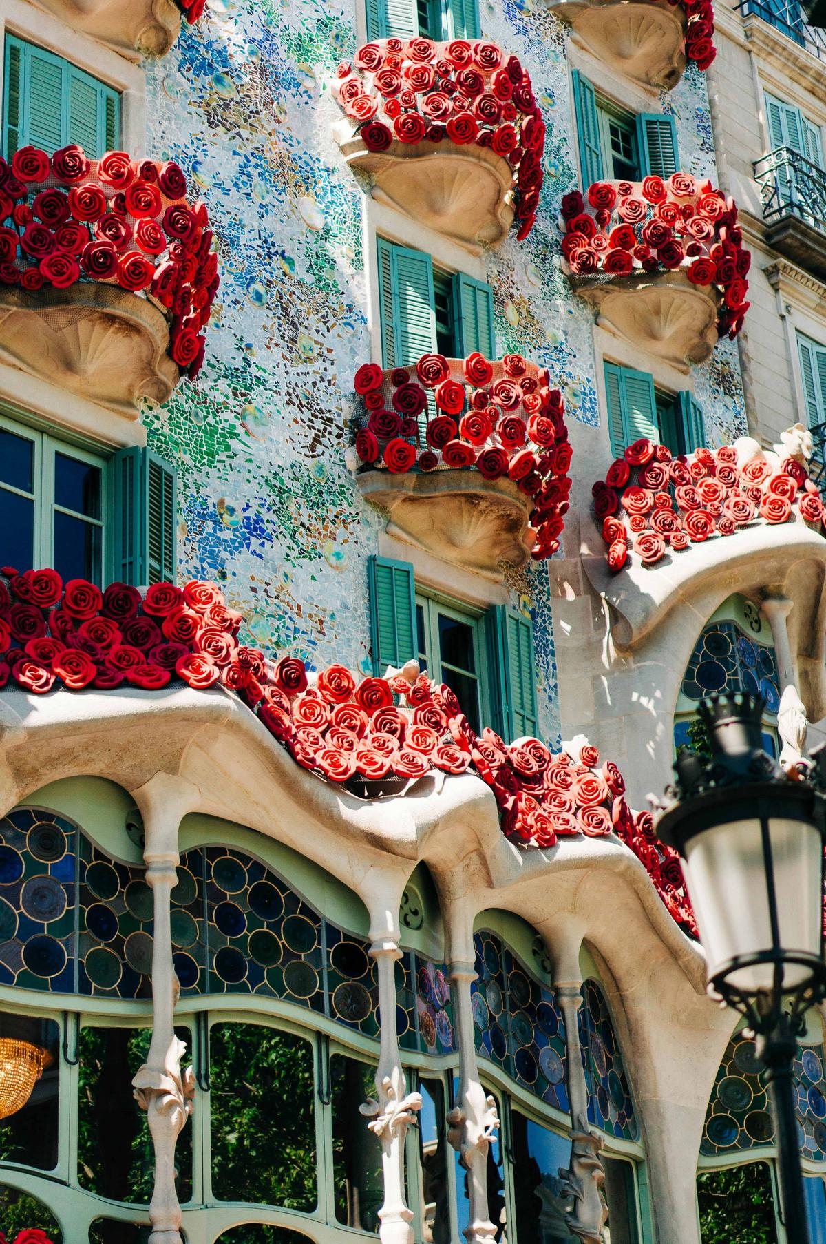 Casa Batlló decorated with roses during the Sant Jordi Festival. (Anna Murzilon/Unsplash)