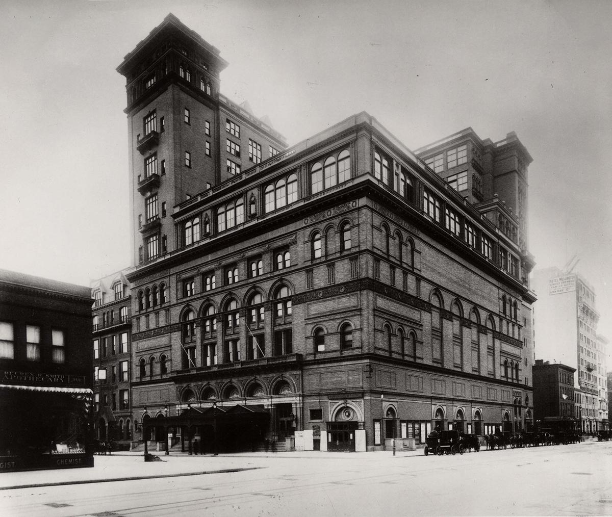 Photo of Carnegie Hall showing the building in its present configuration, following the completion of the studio tower additions in 1896. (Courtesy of Carnegie Hall Archives)