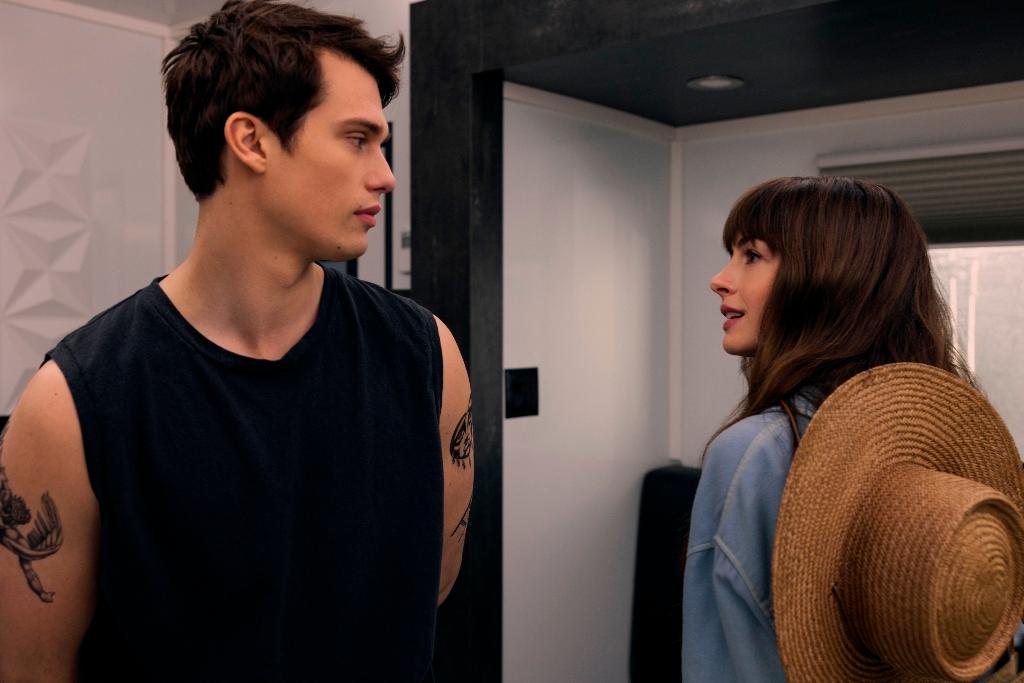 Hayes Campbell (Nicholas Galitzine) and Solène Marchand (Anne Hathaway) "meet-cute," in "The Idea of You." (Prime Video)