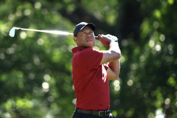 Tiger Woods of the United States tees off on the fourth hole during the final round of the 2024 Masters Tournament at Augusta National Golf Club in Augusta, Ga., on April 14, 2024. (Warren Little/Getty Images)