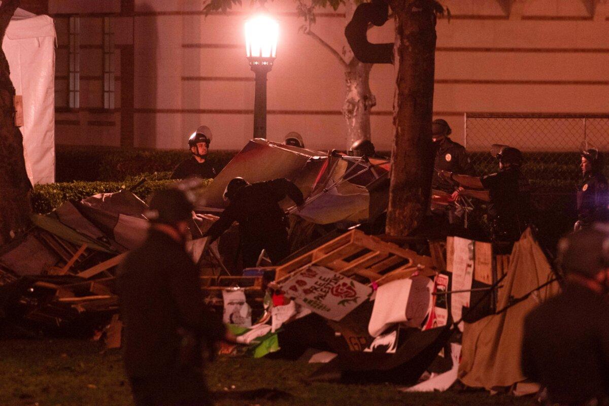 Los Angeles Police Department officers dismantle the pro-Palestinian encampment on Alumni Park at the University of Southern California in Los Angeles on May 5, 2024. (Jason Goode/AFP via Getty Images)