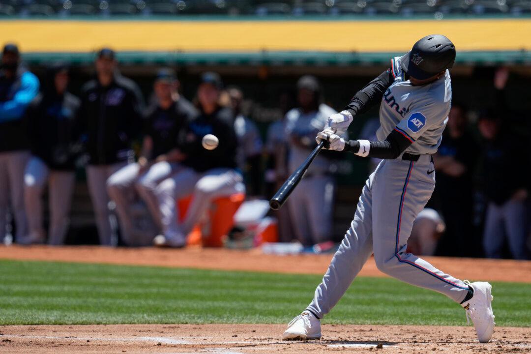 Gordon Homers, Has Four Hits as Marlins Turn Tables on A’s