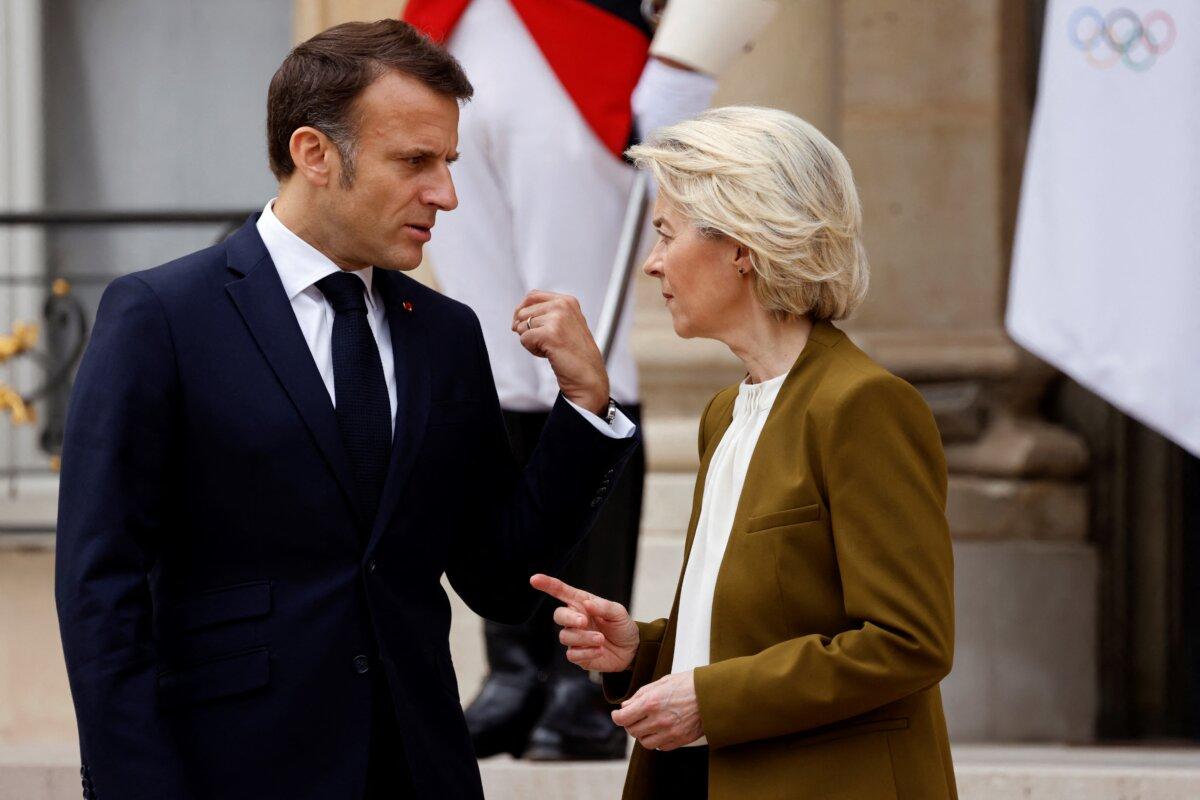 France's President Emmanuel Macron speaks with European Commission President Ursula von der Leyen as they leave after holding a trilateral meeting, which included the Chinese regime leader Xi Jinping, as part of Xi's two-day state visit, at the Elysee Palace in Paris, on May 6, 2024. (Ludovic Marin/AFP via Getty Images)