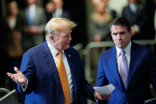 Former President Donald Trump speaks to the media with attorney Todd Blanche at his trial for allegedly covering up hush money payments at Manhattan Criminal Court on May 7, 2024. (Mary Altaffer-Pool/Getty Images)