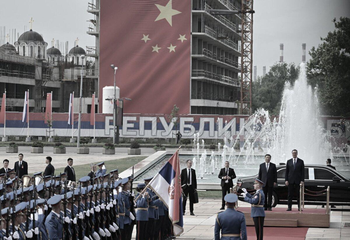 Serbian President Aleksandar Vucic (R) stands next to Chinese Communist Party leader Xi Jinping during a welcome ceremony in Belgrade, on May 8, 2024. (ELVIS BARUKCIC/AFP via Getty Images)