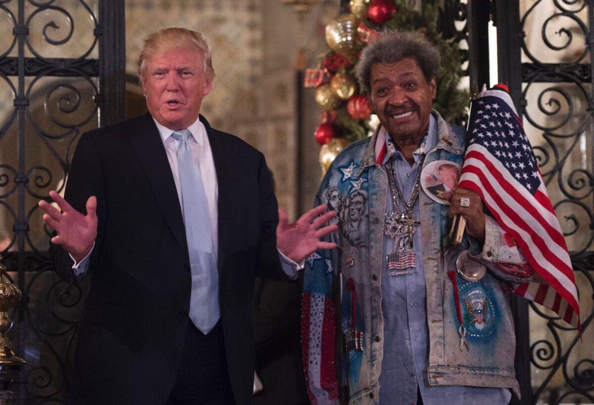 The then-U.S. President-elect Donald Trump, along with boxing promoter Don King, answers questions from the media after a day of meetings at Mar-a-Lago in Palm Beach, Fla., on Dec. 28, 2016. (Don Emmert/AFP via Getty Images)