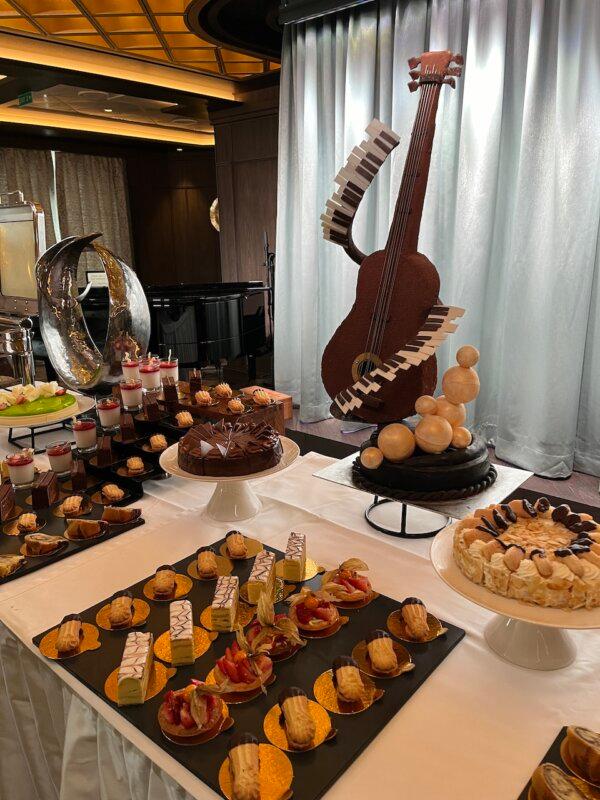 Scones and other pastries at afternoon tea service aboard Regent Seven Seas Grandeur. (Andy Yemma/TNS)