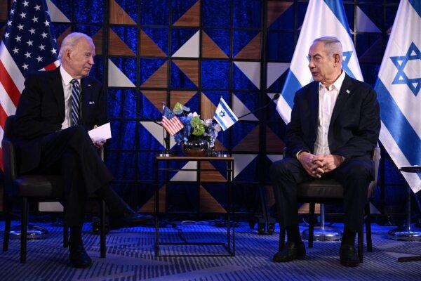 President Joe Biden (L) and Israel's Prime Minister Benjamin Netanyahu (R) speak before a meeting in Tel Aviv, Israel, on October 18, 2023. (Brendan Smialowski/AFP via Getty Images)