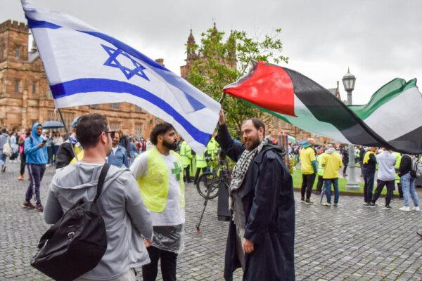 Members of the Australian Palestinian community and Australian Israeli members engage in dialogue at the Palestinian Protest Campsite at the University of Sydney in Australia, on May 3, 2024. (Ayush Kumar/AFP via Getty Images)