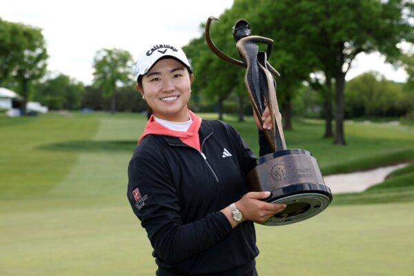 Rose Zhang of the United States poses with the trophy after winning the Cognizant Founders Cup in Clifton, N.J., on May 12, 2024. (Elsa/Getty Images)