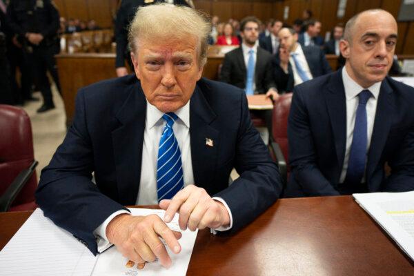 Former President Donald Trump looks on during his criminal trial for allegedly covering up hush money payments at Manhattan Criminal Court, in New York City, on May 13, 2024. (STEVEN HIRSCH/POOL/AFP via Getty Images)