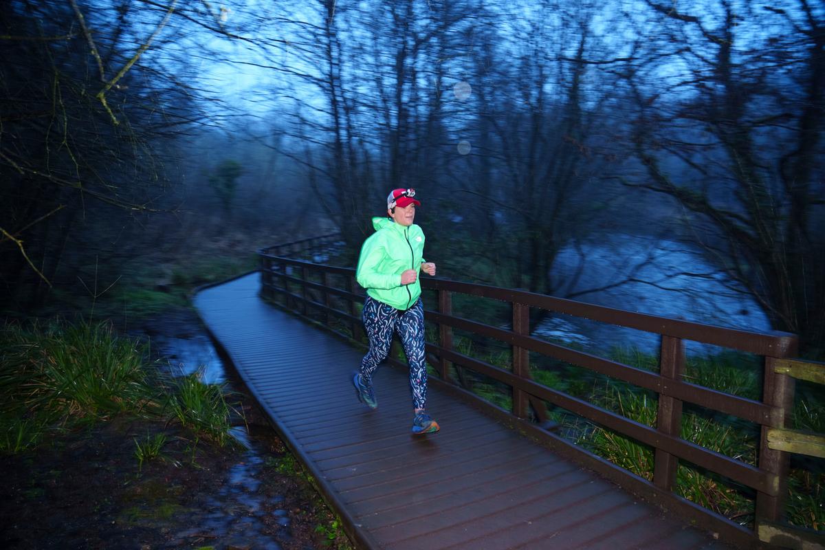 Ms. Ryvar passes through Alyn Waters Country Park in Wrexham during a half marathon in Wrexham, Wales. (Jon Super/AP Photo)