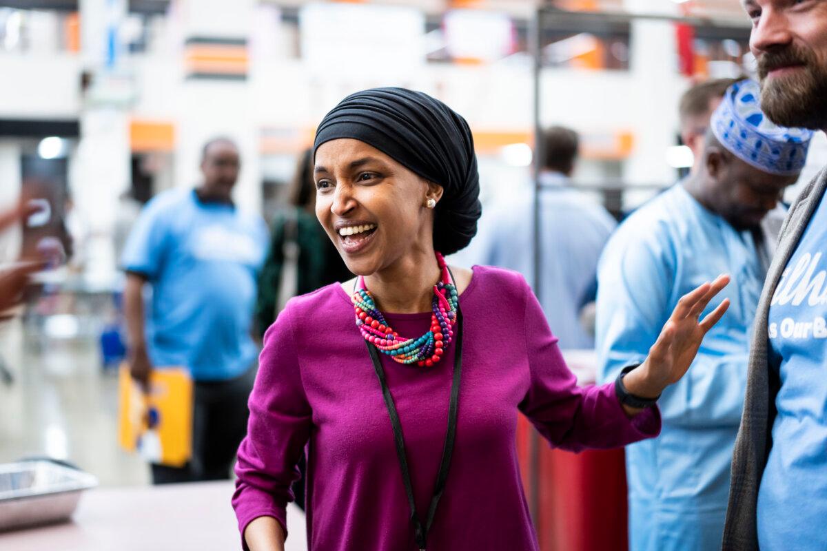 Rep. Ilhan Omar (D-Minn.) greets her supporters at the Minnesota Congressional District 5 Democrat Farmer Labor party’s Nominating Convention in Minneapolis, Minn., on May 11, 2024. (Madalina Vasiliu/The Epoch Times)