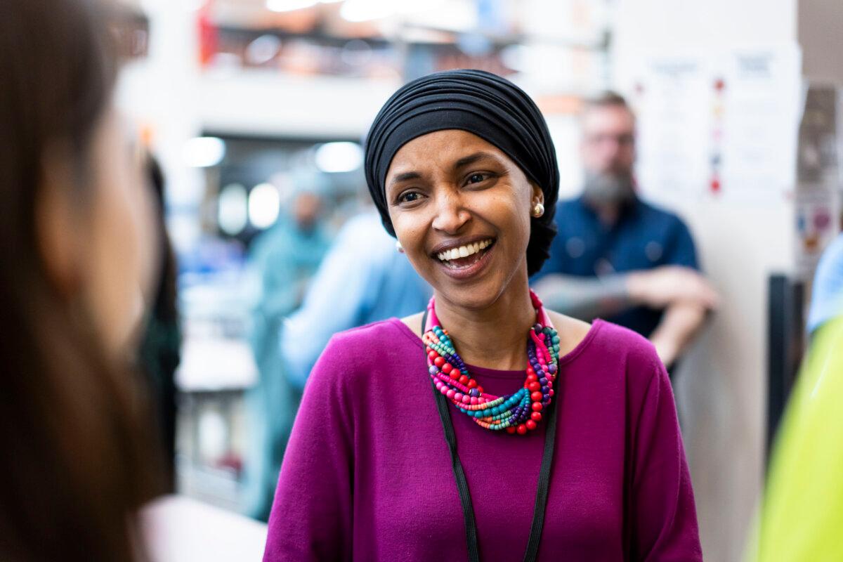 Rep. Ilhan Omar (D-Minn.) greets her supporters at the Minnesota Congressional District 5 Democrat Farmer Labor party’s Nominating Convention in Minneapolis, Minn., on May 11, 2024. (Madalina Vasiliu/The Epoch Times)