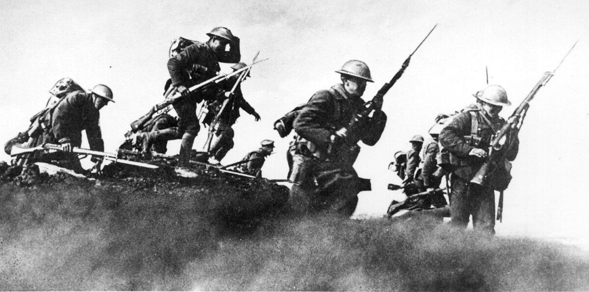 Allied Soldiers climb out of trenches in this World War I photo. (CP Picture Archive/AP)