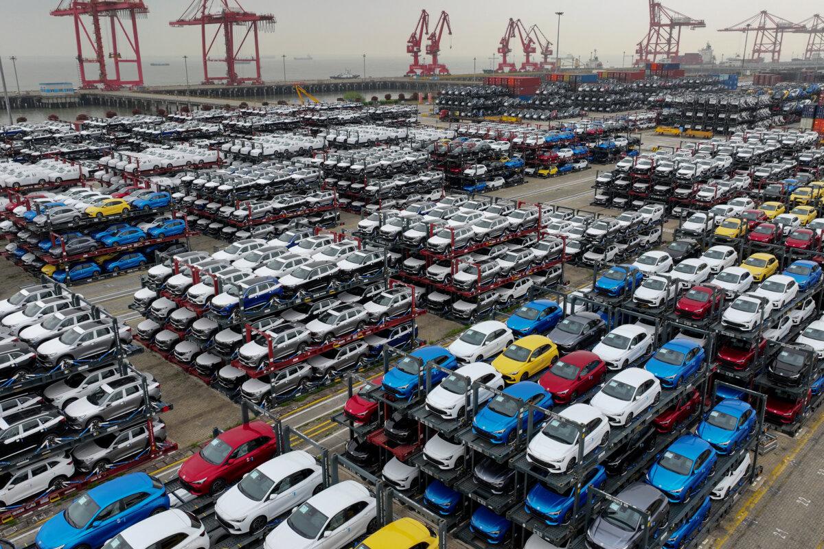 Slectric cars for export stacked at the international container terminal of Taicang Port in Suzhou, in China's eastern Jiangsu Province, on April 16, 2024. (STR/AFP via Getty Images)