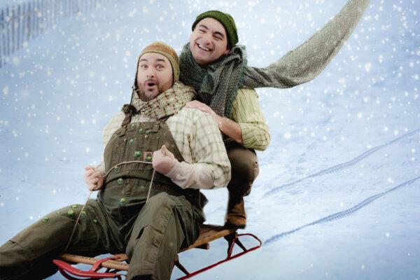Two amphibian best friends, played by Nick Druzbanski (L) Eduardo Curley-Carrillo, and go on a winter sled adventure, in "A Year With Frog and Toad." (Amy Nelson)