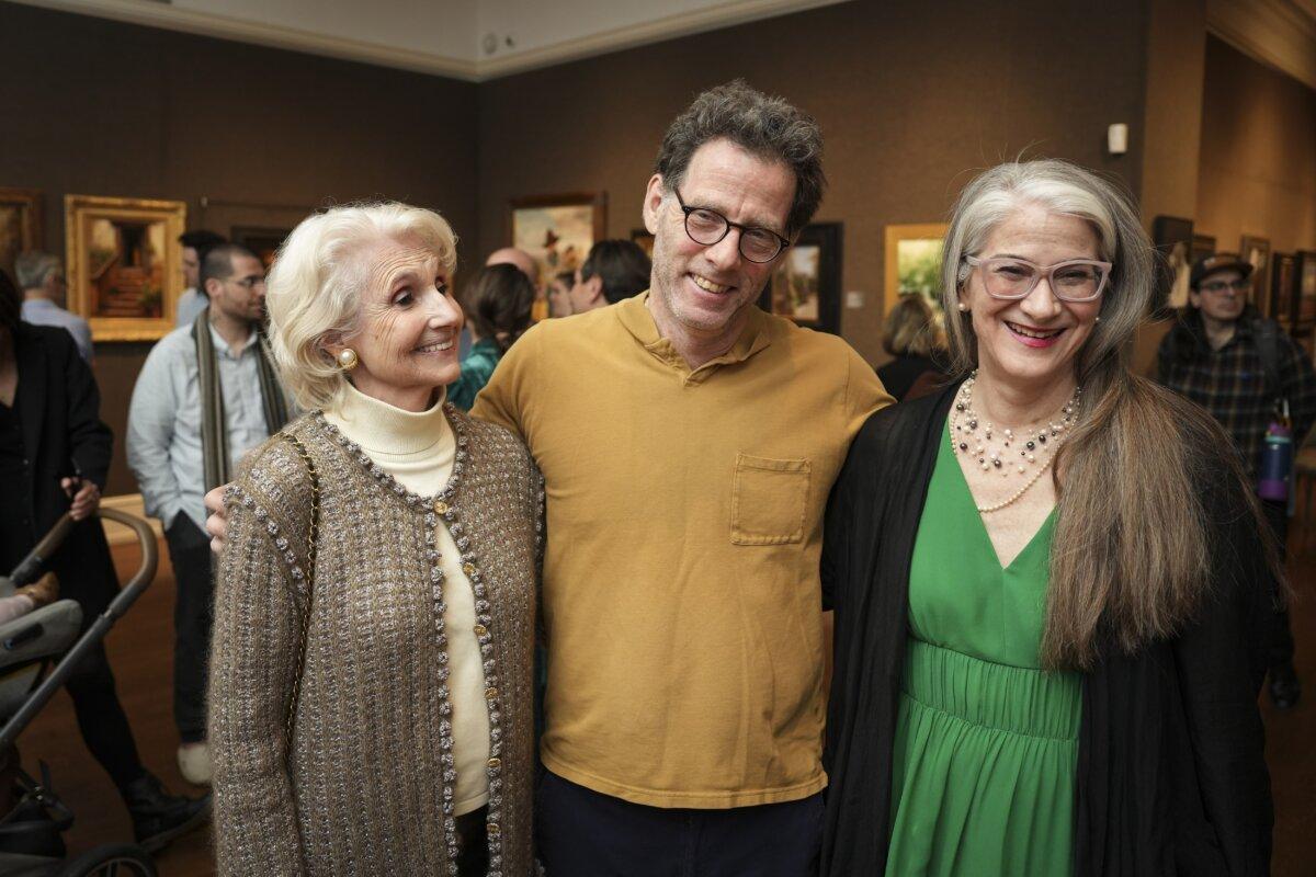 (L–R) Judith Pond Kudlow, Jacob Collins, and Milène J. Fernández at the reception of The Third Annual Hartley Invitational exhibition and sale at The Salmagundi Club in New York City on May 9, 2024. (Samira Bouaou/The Epoch Times)