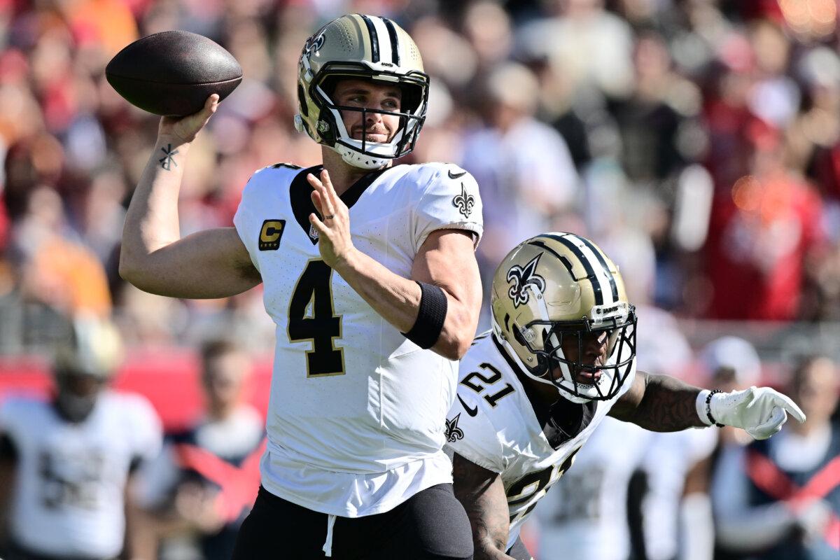 Derek Carr #4 of the New Orleans Saints throws a pass during the second quarter against the Tampa Bay Buccaneers at Raymond James Stadium in Tampa, Fla., on Dec. 31, 2023. (Julio Aguilar/Getty Images)