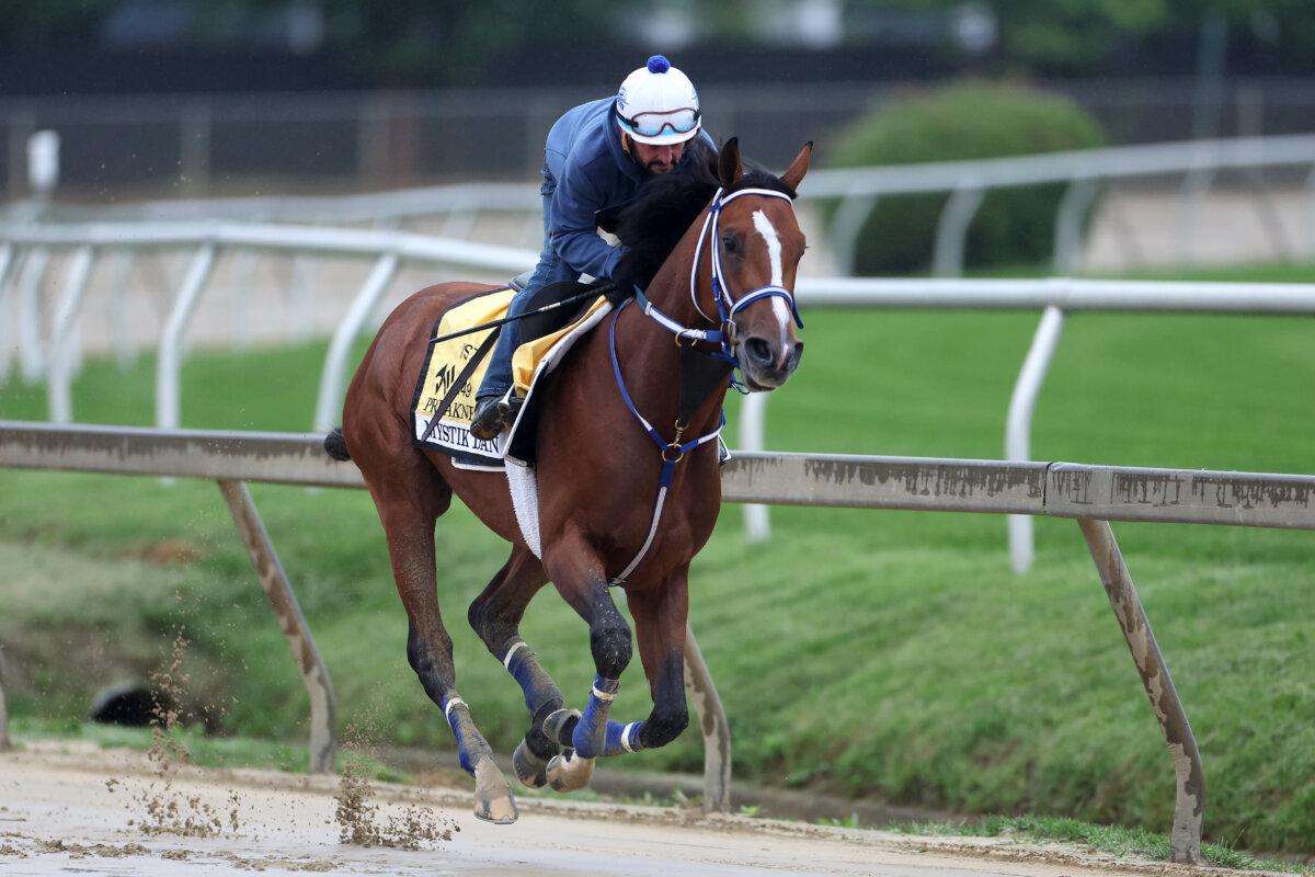 Exercise rider Robby Albarado takes Kentucky Derby winner Mystik Dan over the track during a training session ahead of the 149th running of the Preakness Stakes at Pimlico Race Course in Baltimore, Md., on May 15, 2024. (Rob Carr/Getty Images)