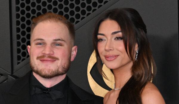 Zach Bryan and girlfriend Brianna Chickenfry arrive for the 66th Annual Grammy Awards in Los Angeles on Feb. 4, 2024. (Robyn Beck/AFP via Getty Images)