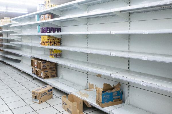 Empty shelves are seen at a supermarket in Noumea on May 16, 2024, amid protests linked to a debate on a constitutional bill aimed at enlarging the electorate for upcoming elections of the overseas French territory of New Caledonia. (Delphine Mayeur/AFP via Getty Images)