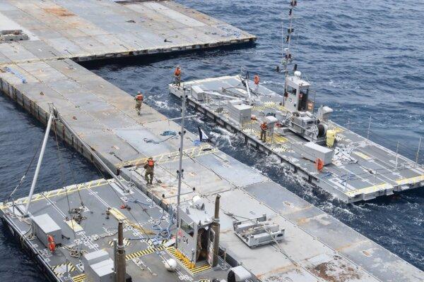 U.S. service men at work assembling the Joint Logistics Over-the-Shore system (JLOTS) in the Mediterranean Sea. (US Central Command)