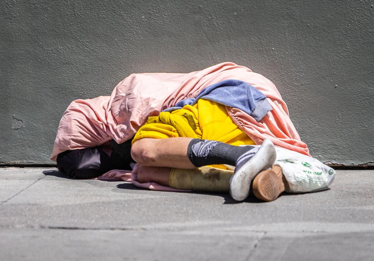 Homeless person in San Francisco's Tenderloin District on May 16, 2024 (John Fredrick/Epoch Times)