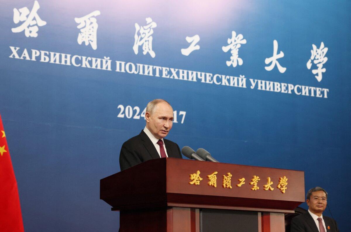 Russia's President Vladimir Putin meets with students at Harbin Institute of Technology in Harbin, China, on May 17, 2024. (Mikhail Metzel/Pool/AFP via Getty Images)