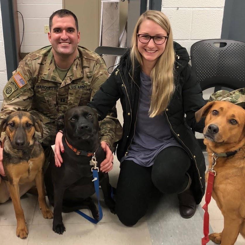 Mr. and Mrs. Marquette with Nola (L) and their other pet dogs. (Courtesy of Vanessa and Ryan Marquette)