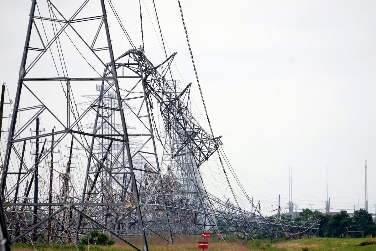 Downed power lines are shown in the aftermath of a severe thunderstorm in Cypress, Texas, near Houston, on May 17, 2024. (David J. Phillip/AP Photo)