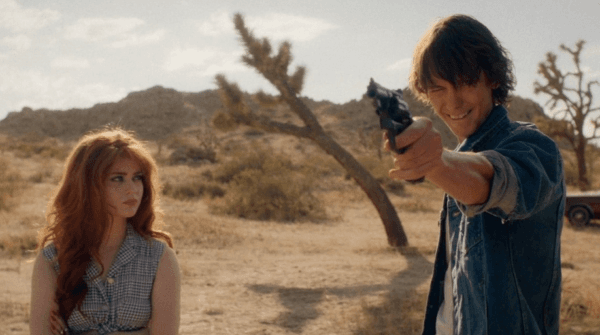 Sybil (Sierra McCormick) and her not-too-bright boyfriend, Miles (Ryan Masson), at target practice. Miles can't hit a beer can at five paces, in "The Last Stop in Yuma County." (Well Go USA Entertainment)