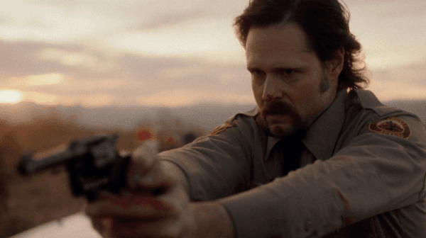 Charlie the Sheriff (Michael Abbott Jr.) does some investigating, in "The Last Stop in Yuma County." (Well Go USA Entertainment)