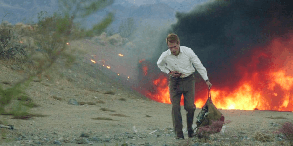 The Knife Salesman (Jim Cummings) flees the scene of the crime (or at least one of them), in "The Last Stop in Yuma County." (Well Go USA Entertainment)