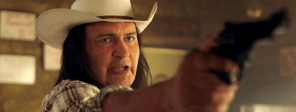 Pete (Jon Proudstar) stands up for Charlotte, in "The Last Stop in Yuma County." (Well Go USA Entertainment)