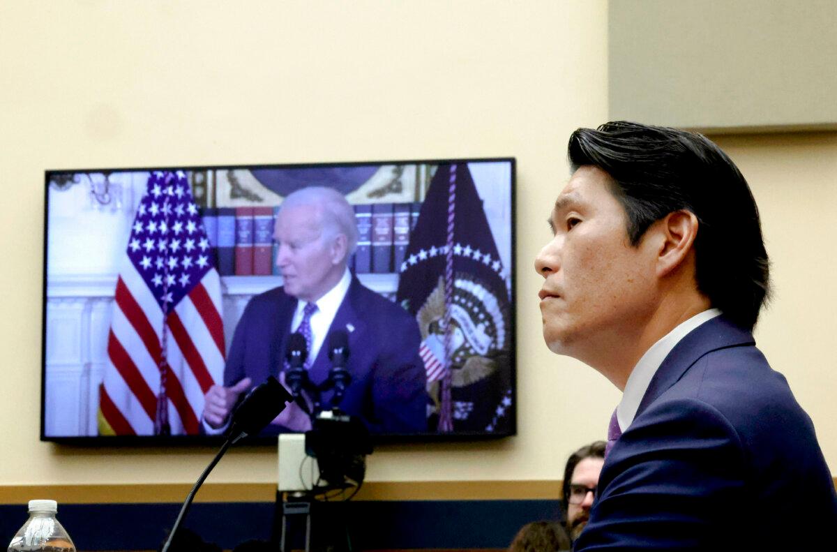Former special counsel Robert K. Hur testifies alongside a video of President Joe Biden before the House Judiciary Committee in Washington on March 12, 2024. (Chip Somodevilla/Getty Images)
