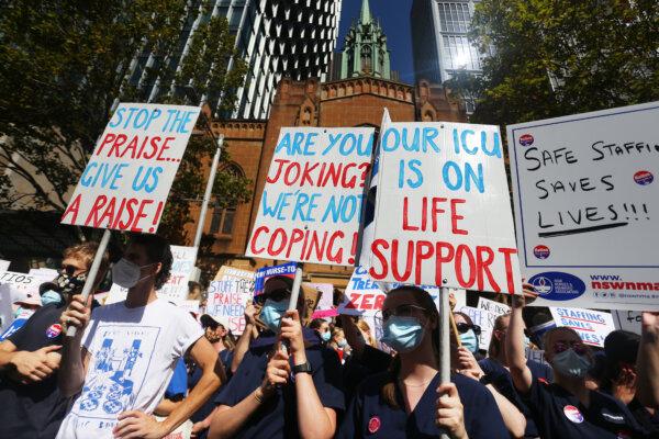 Nurses and members of the health sector rally outside NSW Parliament House in Sydney, Australia, on Feb. 15, 2022. (Lisa Maree Williams/Getty Images)