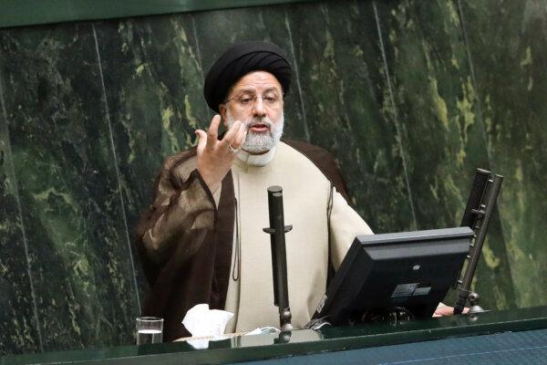 Iranian leader Ebrahim Raisi addressing parliament in Tehran, Iran, on Nov. 16, 2021. (Vahid Salemi/AP Photo)