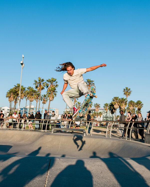 A man throughs a trick at the skate park at Venice Beach on April 3, 2024, in Venice, California. (Jason Armond/Los Angeles Times/TNS)