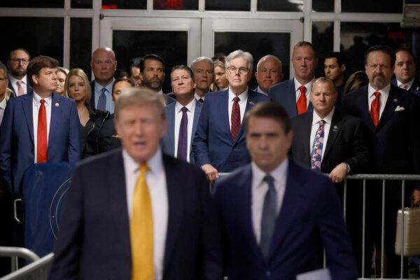 Supporters, family, and court officers watch as former president and Republican presidential candidate Donald Trump next to his lawyer Todd Blanche (R), speaks to the press during his criminal trial at Manhattan Criminal Court in New York City on May 21, 2024. After approximately five weeks, 19 witnesses, reams of documents and a dash of salacious testimony, the prosecution against Donald Trump rested its case May 21, 2024, handing over to the defense before closing arguments expected next week. (MICHAEL M. SANTIAGO/POOL/AFP via Getty Images)