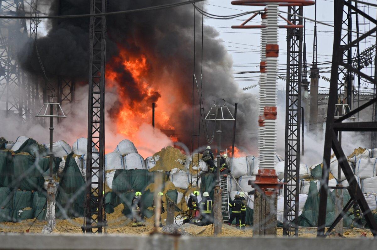 Crews extinguish a fire at an electrical substation after a missile attack in Kharkiv, Ukraine, on March 22, 2024. (Sergey Bobok/AFP via Getty Images)