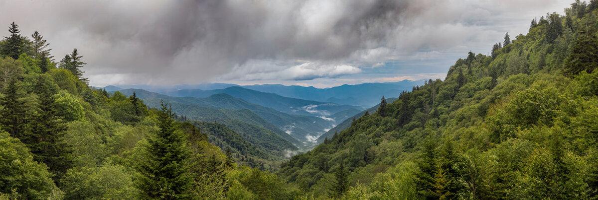 Morning clouds roll over the Appalachian Range’s blue ridges in Great Smoky Mountains National Park near the border of North Carolina and Tennessee. (Kenneth Keifer/Shutterstock)