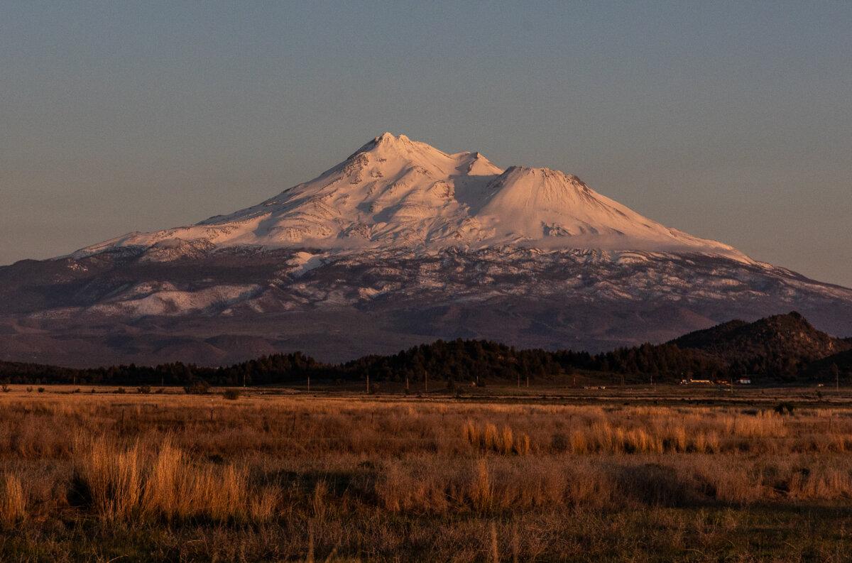 The evening sun hits the face of Mount Shasta outside of Montague, Calif., on May 7, 2024. (John Fredricks/The Epoch Times)