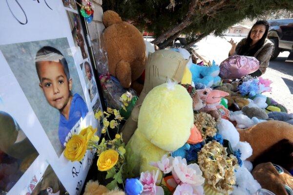 Wanda Ahasteen stops by a memorial for a 6-year-old Deshaun Martinez in Flagstaff, Ariz., in this March 4, 2020, file photo. (Jake Bacon/Arizona Daily Sun via AP)