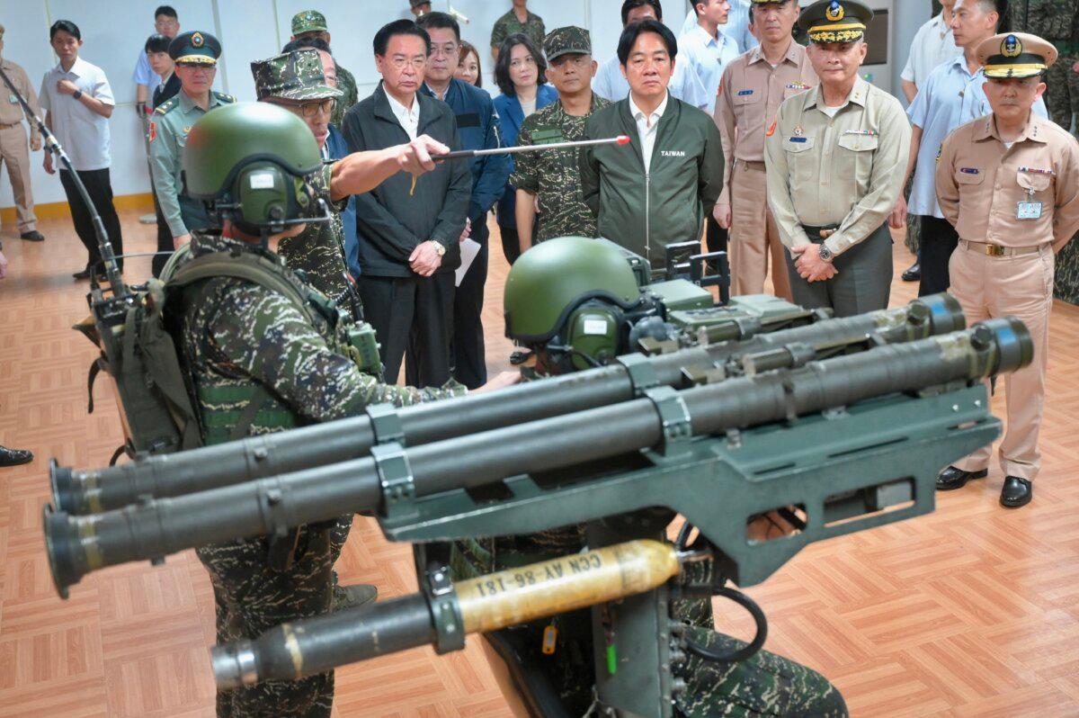 Taiwan President Lai Ching-te (C) watches a demonstration on the U.S.-made Stinger air-defence system during a visit to inspect military troops in Taoyuan on May 23, 2024. (Sam Yeh / AFP via Getty Images)