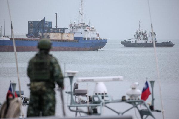 A member of Taiwan's military (front) takes part in routine exercises at the port of Liaoluo in Kinmen, Taiwan, on May 24, 2024. (I-hwa Cheng/AFP via Getty Images)